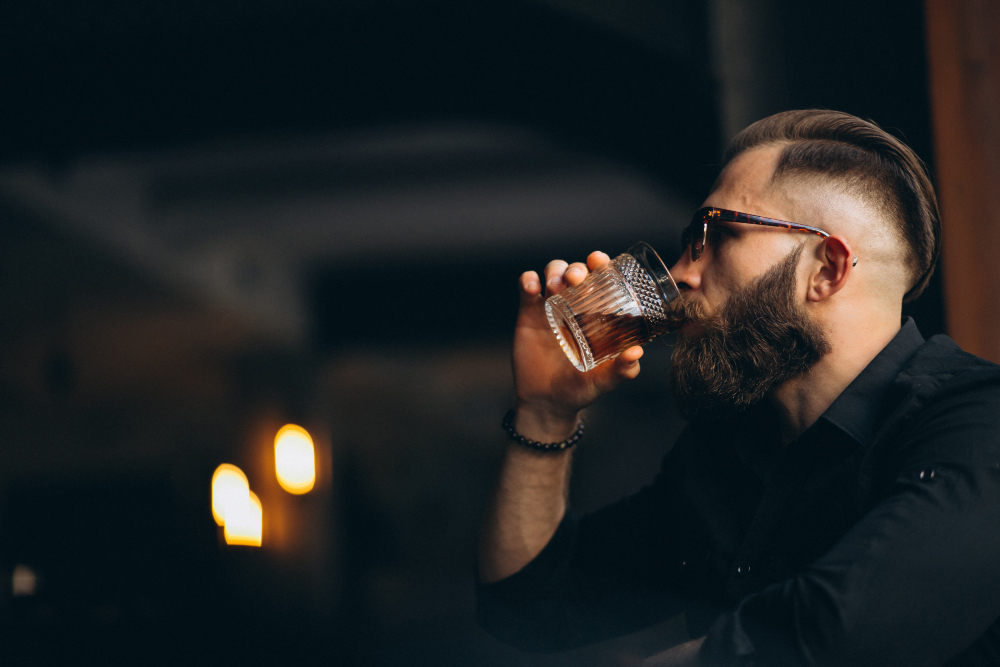 Czerwona twarz i plamy po alkoholu